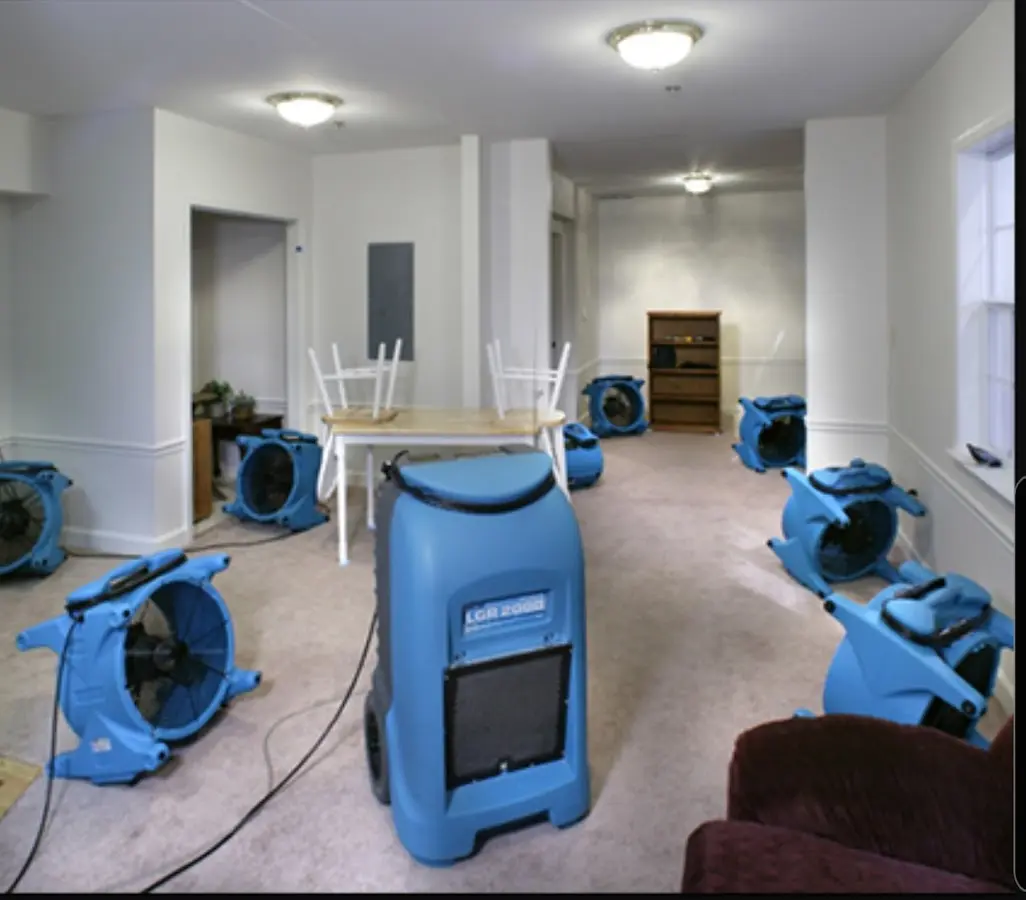 Air movers and dehumidifier setup for Water Damage Restoration in Essex